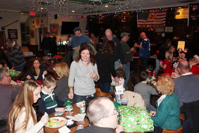 Children's Christmas Party at 8-100. 12-9-2012. Santa pays a visit . Photo by Vincent P. Tuzzolino